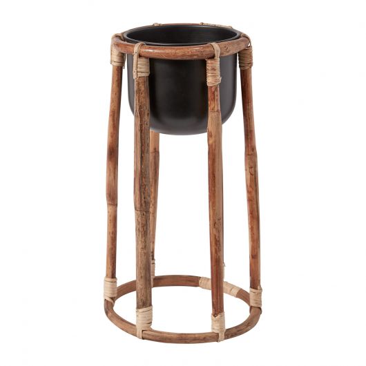 The Bouche Plant Stand elevates your plant with a metal pot that drops into a rattan base. Tropical houseplants. Spider plant, boca plant stand. instant, repot into bigger pot, grow, houseplant pot, houseplant pot, tree, soil,  health and wellness, plant gift idea, home decor, coastal decor, luxury home decor. 