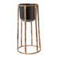 The Bouche Plant Stand elevates your plant with a metal pot that drops into a rattan base. Tropical houseplants. Spider plant, boca plant stand. instant, repot into bigger pot, grow, houseplant pot, houseplant pot, tree, soil,  health and wellness, plant gift idea, home decor, coastal decor, luxury home decor. 
