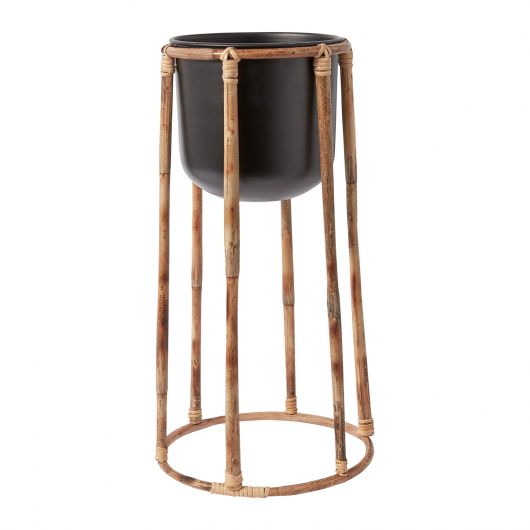The Bouche Plant Stand elevates your plant with a metal pot that drops into a rattan base. Tropical houseplants. Spider plant, boca plant stand. instant, repot into bigger pot, grow, houseplant pot, houseplant pot, tree, soil,  health and wellness, plant gift idea, home decor, coastal decor, luxury home decor. 